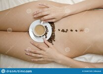 top-view-naked-woman-lying-bed-fresh-cup-coffee-beans-her-thighs-top-view-naked-woman-lying-23...jpg