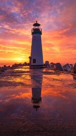 Lighthouse-At-Sunsrise-Fi-Wallpaper-1080x1920.jpg